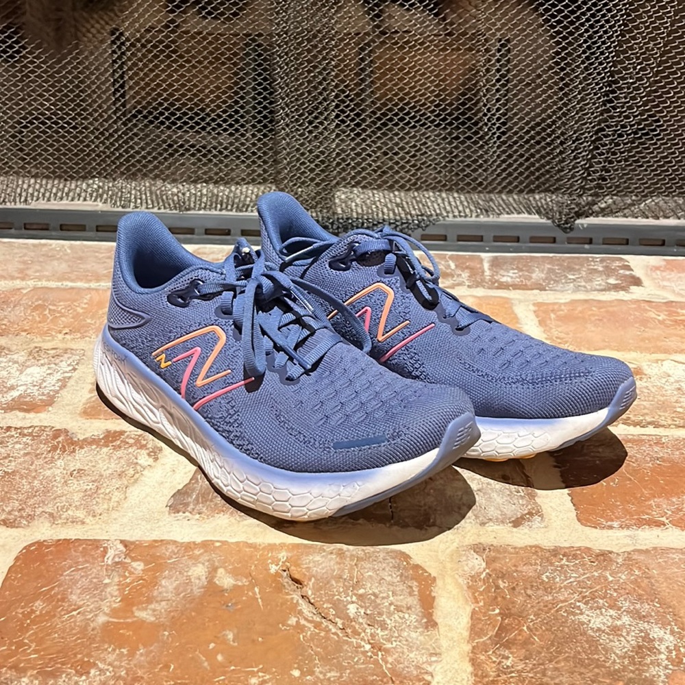 New Balance Women's Blue Athletic Sneakers with Pink Accents
